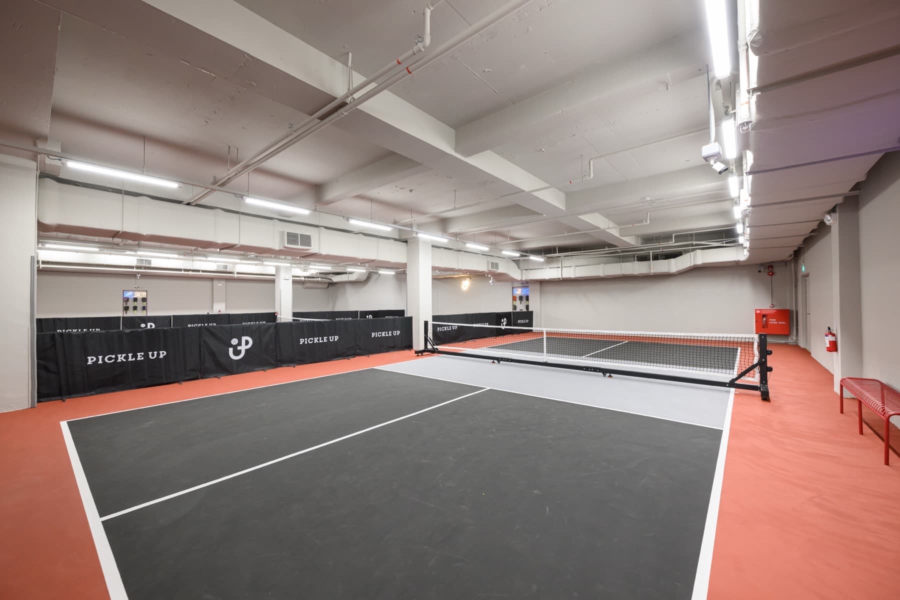 Court 2, an Executive court, empty, seen from the baseline corner.