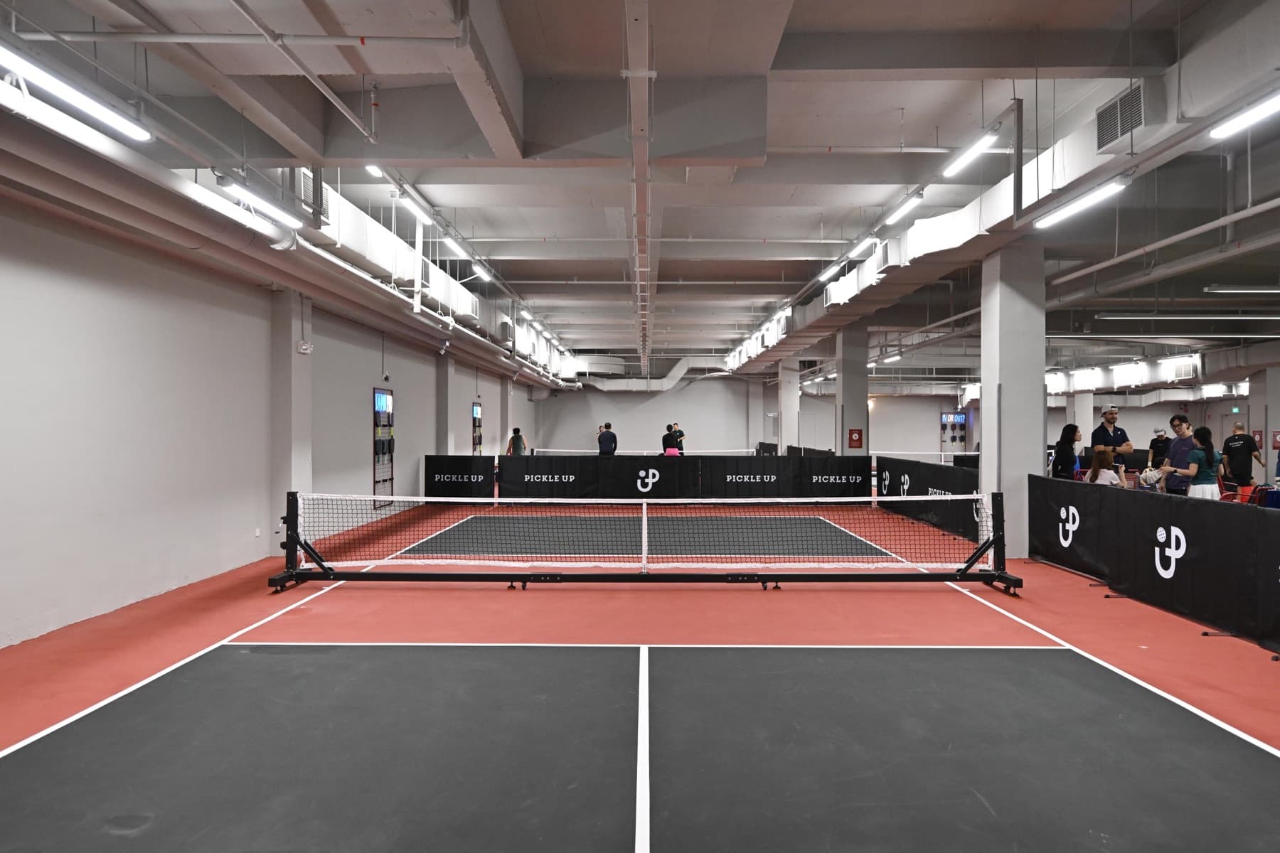 Court 5, a Signature court, empty, looking down the length of the court.